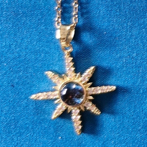 Starburst Necklace - This piece carries the energy of protection, grounding, and intuitive strength